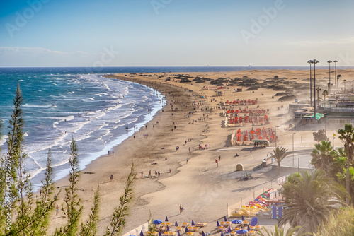 Canary islands Concepts. View of Playa del Ingles Beach in Maspalomas Located in Gran Canaria with Sand Storm photo