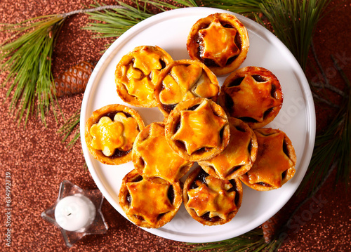 Homemade mincemeat pies on plate photo