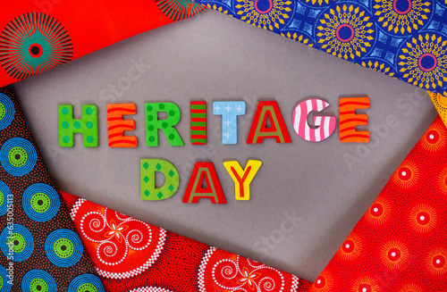 Heritage Day South Africa, 24th September. Heritage Day written in colorful letters with iconic South African printed cloth