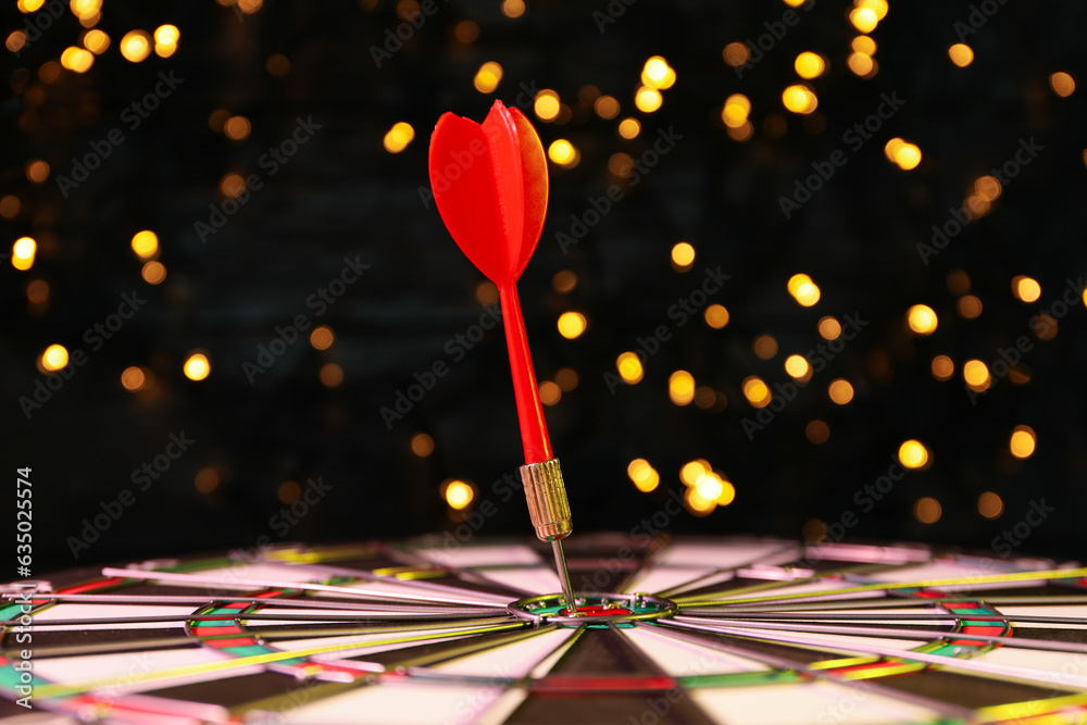Darts hitting the target game at the party. Darts hitting the target game at the party.