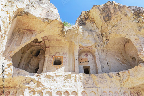 Fotografie Entrance to the Dark church in volcanic landscape at Goreme Open air museum