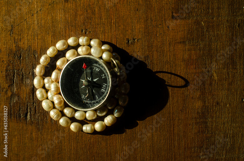 compass and jewelry