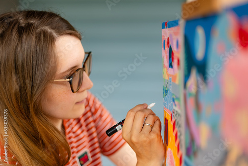 Artist woman with a painting