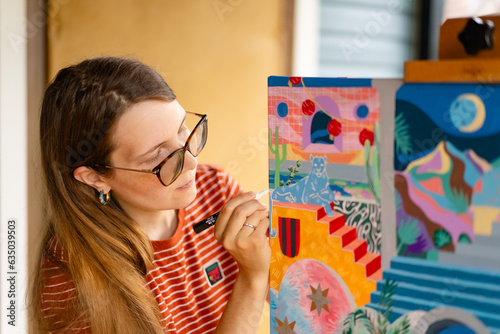 Artist woman with a painting