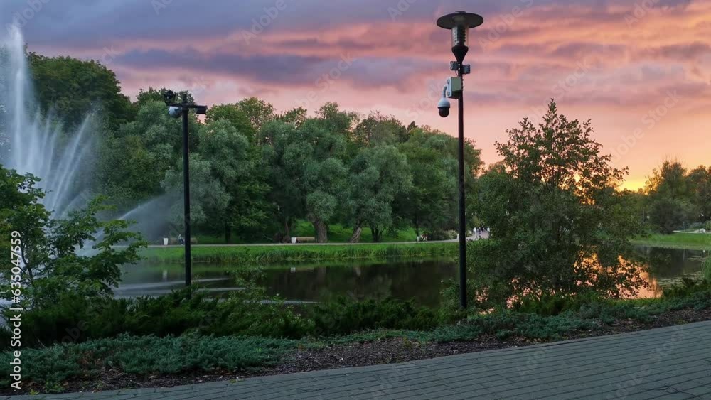 Video surveillance in park on colorful sunset Video surveillance in park on colorful sunset