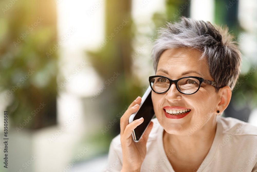 Closeup of wealthy mature lady have phone conversation, copy space Closeup of wealthy mature lady have phone conversation, copy space