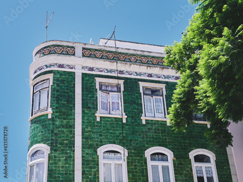 A facade of green tiles, Portugal.