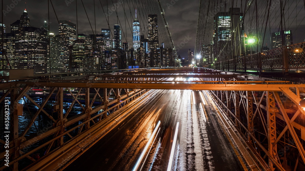 Heavy traffic on the Brooklyn Bridge in rainy weather. NYC, USA. Heavy traffic on the Brooklyn Bridge in rainy weather. NYC, USA.