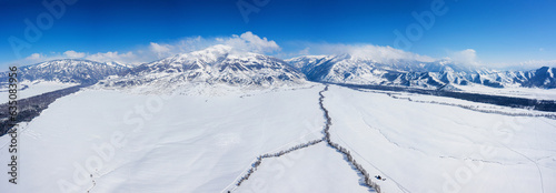 Altai Mountains in winter: Terektinsky ridge. Aerial view.