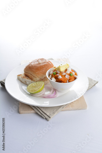 indian vegetable bean curry with baked bread bun burger toast onion lime breakfast on white background asian chef appetiser halal bakery food restaurant pastry menu for cafe