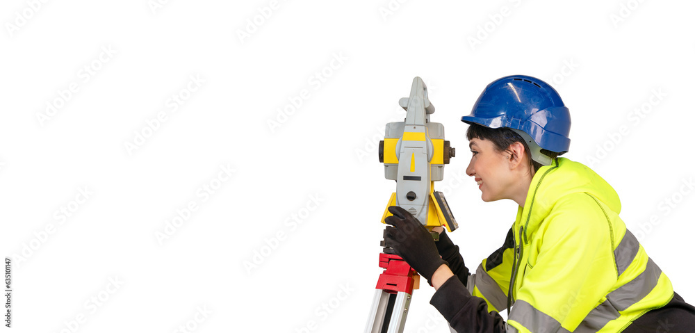 Woman in blue hard hat and yellow protective clothes land surveyor working with modern surveying geodesic instrument tachometer checking coordinates. Young woman working in construction industry Woman in blue hard hat and yellow protective clothes land surveyor working with modern surveying geodesic instrument tachometer checking coordinates. Young woman working in construction industry