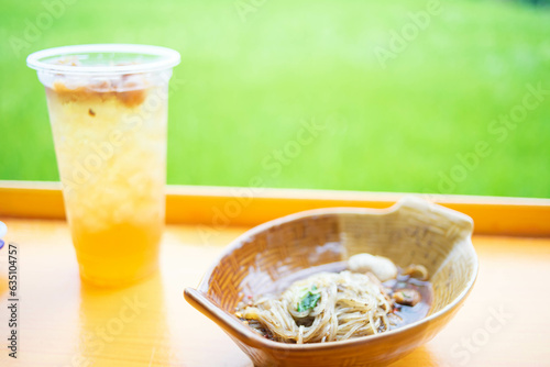 Street food, guaytiao, noodles with lots of side dishes photo