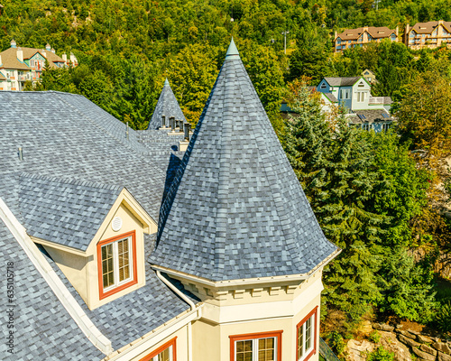 Mont Tremblant, beautiful national park and village in harmony with nature, Tiled roofs of hotels. The unique and wonderful resort village of Mont Tremblant, Quebec, Canada. High quality photo photo