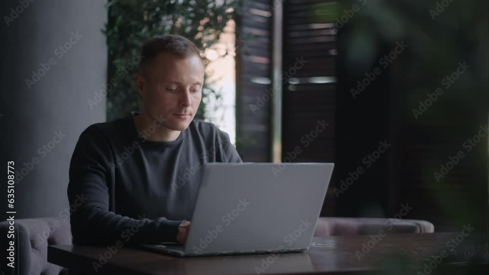 Middle-Aged Businessman Working With Laptop In Cafe, Smart Financial Analyst Man Working Online Middle-Aged Businessman Working With Laptop In Cafe, Smart Financial Analyst Man Working Online