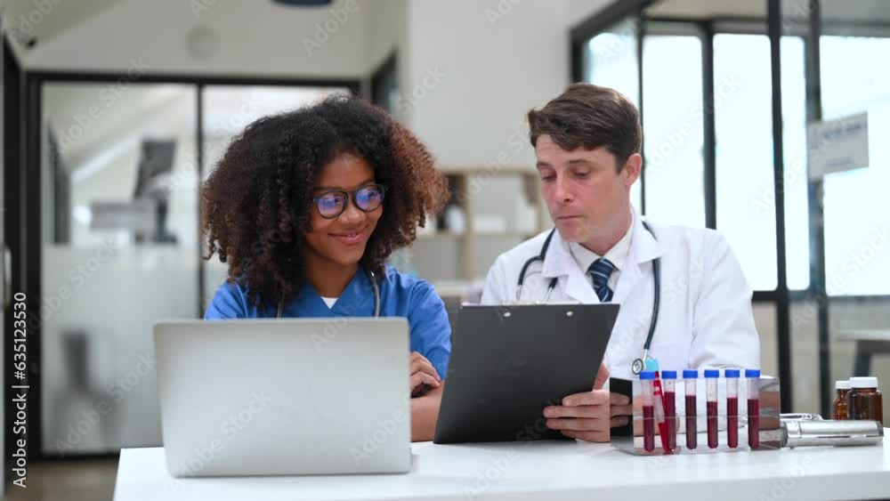 Modern Medical Research Laboratory: Portrait of Two African Scientists Working, Using Digital Tablet, Analyzing Samples, Talking. for Medicine, Biotechnology Development. Modern Medical Research Laboratory: Portrait of Two African Scientists Working, Using Digital Tablet, Analyzing Samples, Talking. for Medicine, Biotechnology Development.