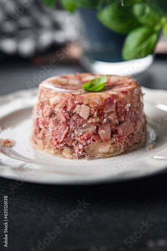 brawn food meat Sülze pieces of meat in jelly pork, beef meat product ready to eat healthy meal food snack on the table copy space food background rustic top view photo