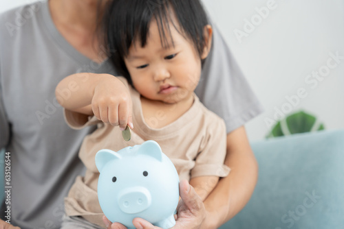 Save money. Smart modern  woman putting coin into piggy bank for saving. wealth, Finance, business, investment, retirement, future, accounting, plan life, economize, banking, family, health..