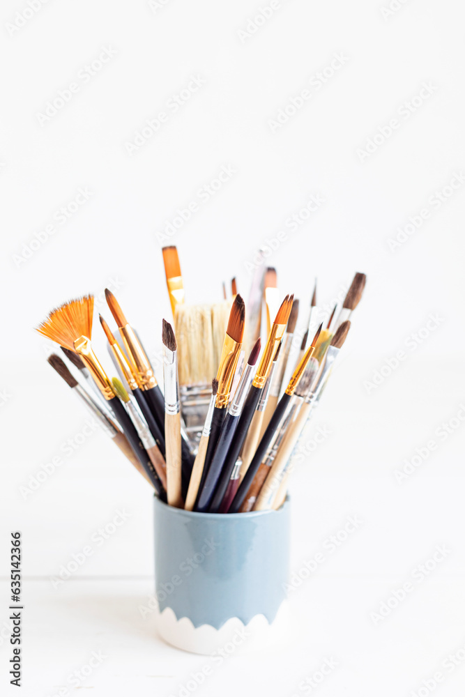 Set of painting brushes . Craft artistic background. Recomforting, destressing creative hobby, art therapy Set of painting brushes . Craft artistic background. Recomforting, destressing creative hobby, art therapy
