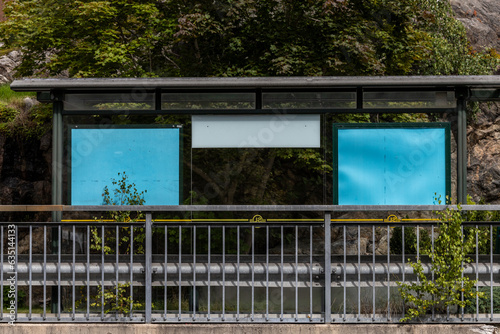 Photography Stockholm, Sweden An empty bus stop with blue panels instead of advertisements