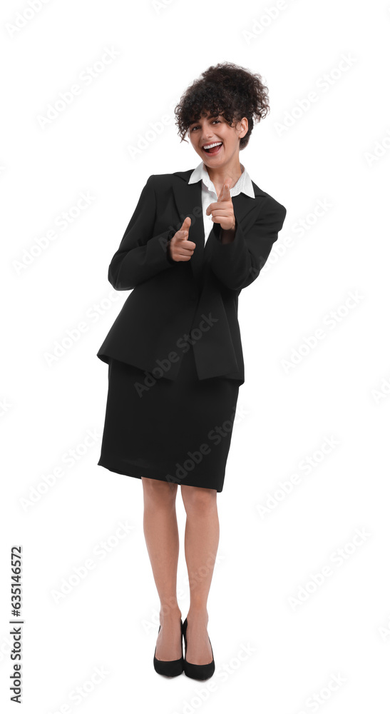 Beautiful emotional businesswoman pointing at something in suit on white background Beautiful emotional businesswoman pointing at something in suit on white background
