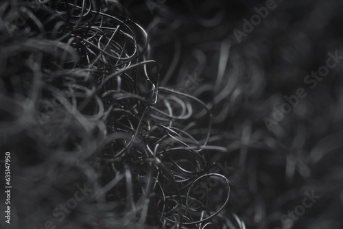 Foto Black hook-and-loop fastener as background, closeup view