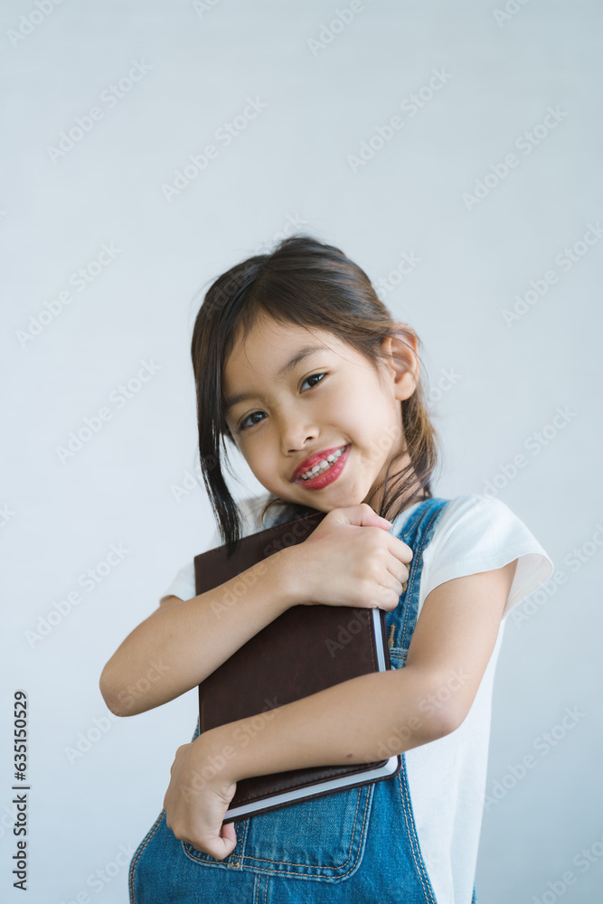 The girl is reading a book and having fun. The girl is reading a book and having fun.