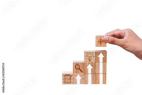 Place wooden blocks as a step towards the goal. Business ideas for successful growth process.PNG