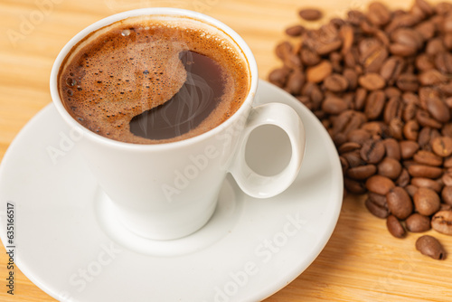 cup of coffee with beans © abdullah