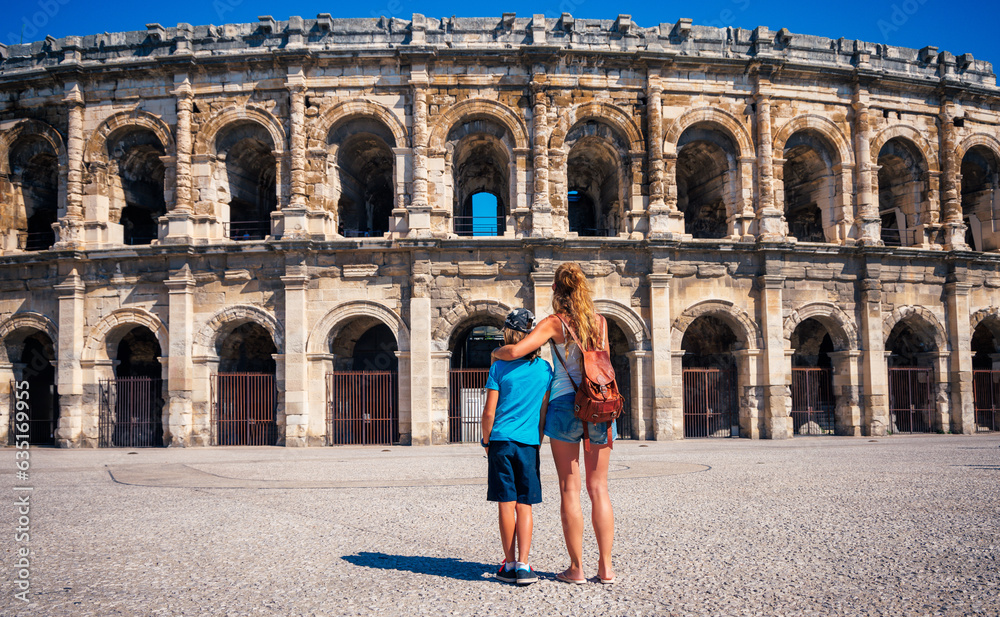 mother and son visiting Nimes city Arena in France