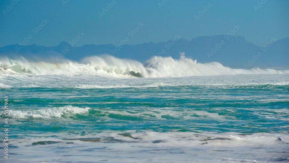 powerful cross ocean wave breaking during the day on the beach powerful cross ocean wave breaking during the day on the beach