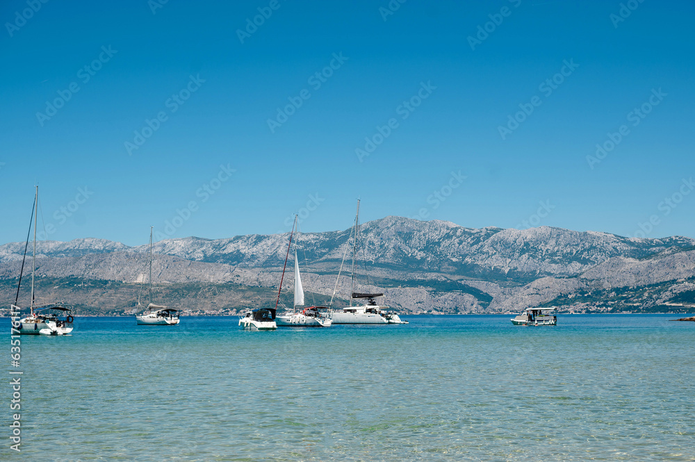Adriatic sea with many motor yachts and mountains