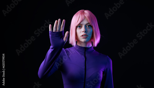 Woman in futuristic sport costume. Augmented reality game, future technology, AI concept. VR. Neon blue light. Dark background.