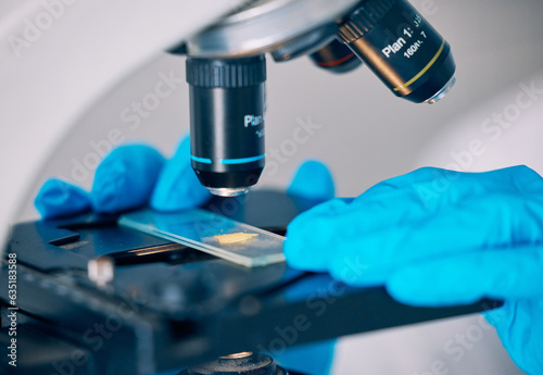 Microscope, worker hands and science worker research with technology testing for a pharmaceutical or medical study. Chemistry, biometric and molecule analytics for particles and person in hospital