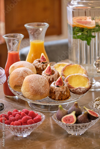Pastry and fruits in glassware