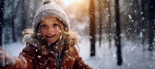 A young girl watches in wonder at the first snowfall of the season, her face glowing with enchantment. Capturing natural beauty and childhood innocence in winter.