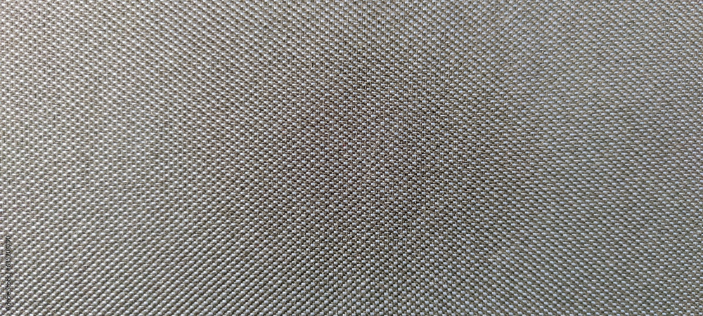 Close-up view of dark gray textile textured background. Abstract fabric material pattern. Copy space for your text or decoration. Close-up view of dark gray textile textured background. Abstract fabric material pattern. Copy space for your text or decoration.