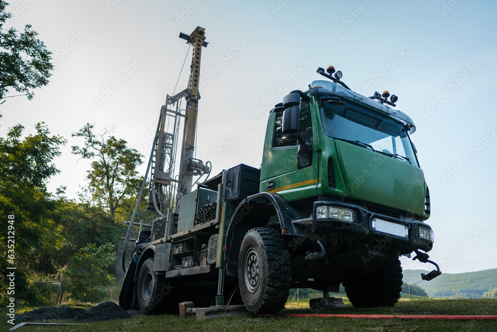 Water well drilling rig preparing to boring dowin into the earth. Water well drilling rig preparing to boring dowin into the earth.