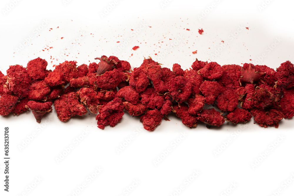 Dried pomegranate flower isolated on a white background.
