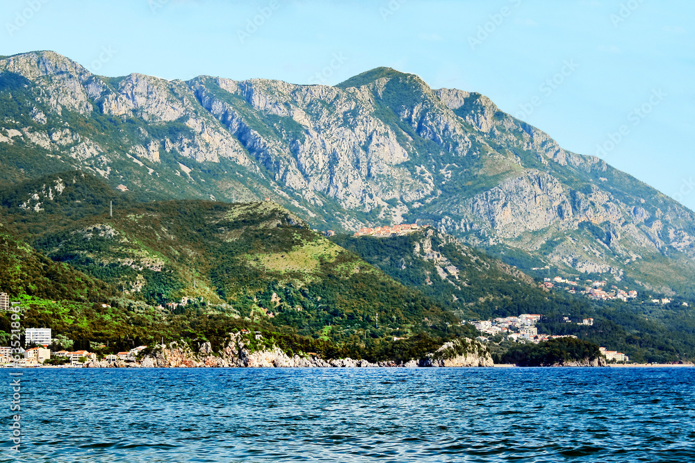 Montenegro. Becici. View from the beach to the mountains and the sea