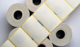 White labels isolated. Labels for direct thermal or thermal transfer printing. Blank sticky label roll for thermal transfer printing price. White roll of labels for thermal label.