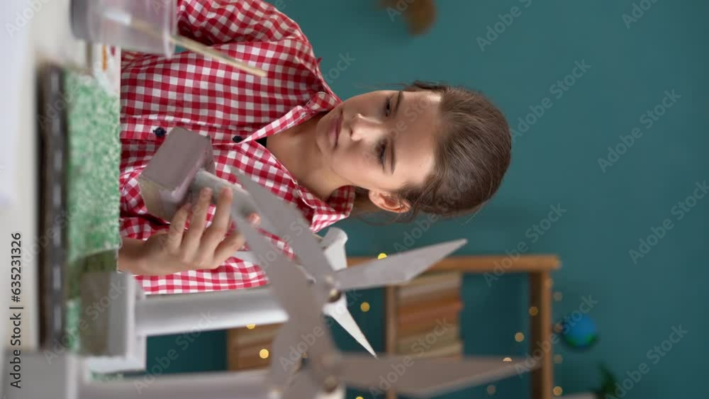 Student at home studying renewable energy and creating a 3D project studying at home