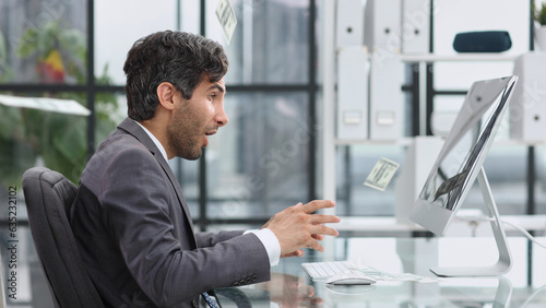 Wallpaper Mural Shocking news. Surprised young man in a suit and tie looking at Torontodigital.ca