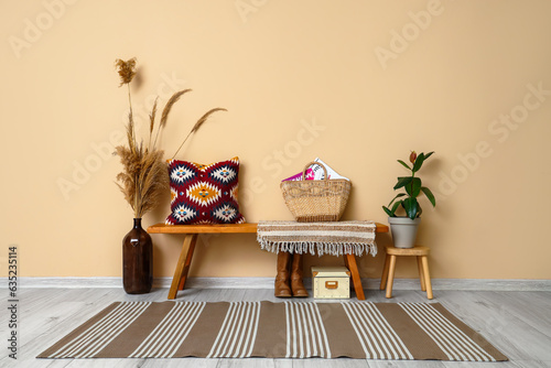 Wooden bench with wicker ba...