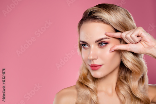 Fotografie Photo of attractive lady touch eye apply anti aging laser correction isolated on