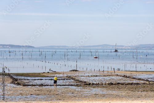 Woman contemplates a fishing area