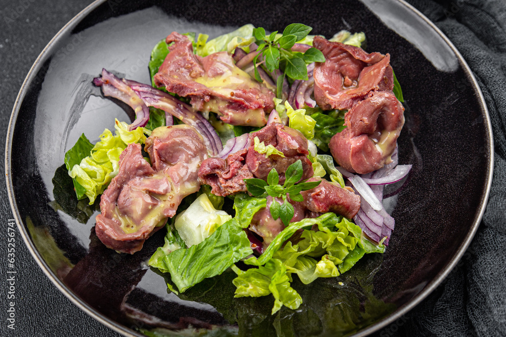 chicken stomach salad green lettuce, onion chicken meat offal vegetable meal food snack on the table copy space food background rustic top view chicken stomach salad green lettuce, onion chicken meat offal vegetable meal food snack on the table copy space food background rustic top view