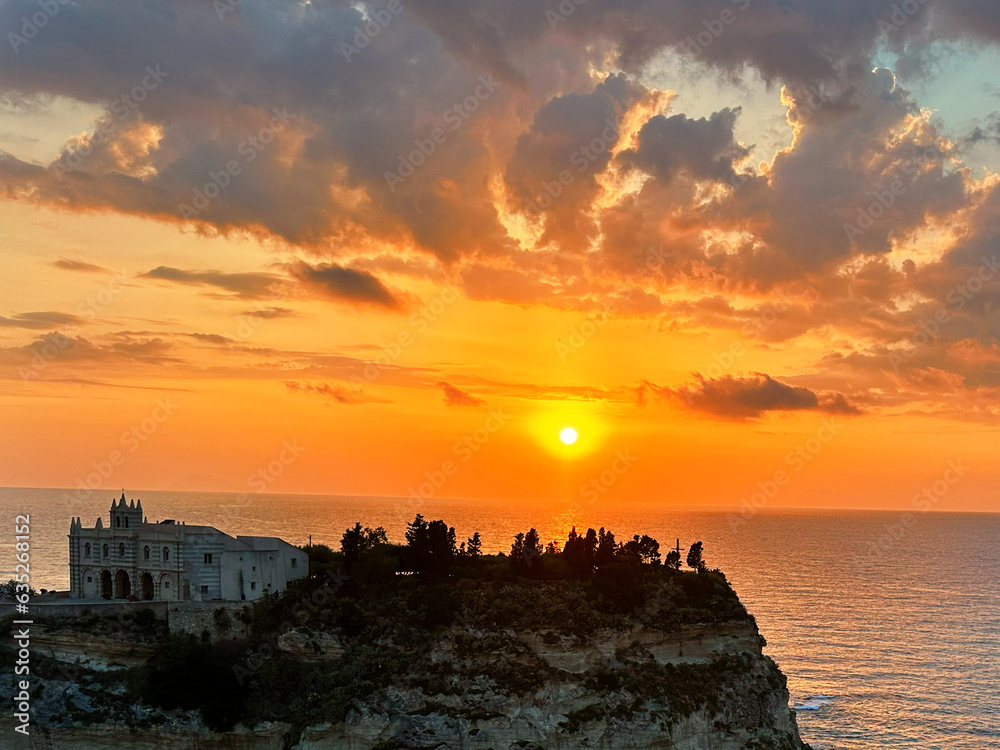 Tropea aerial view: Sunset Views from the Cliffs Overlooking Turquoise Waters in Italy	