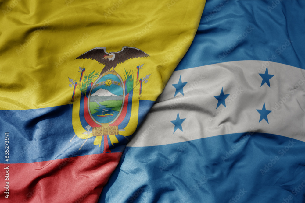 big waving realistic national colorful flag of ecuador and national flag of honduras .