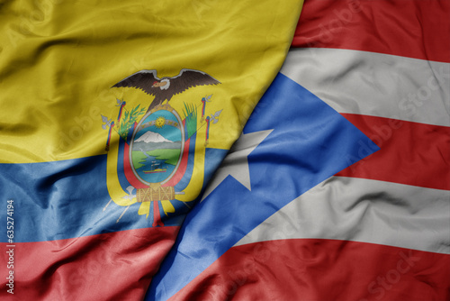 big waving realistic national colorful flag of ecuador and national flag of puerto rico .