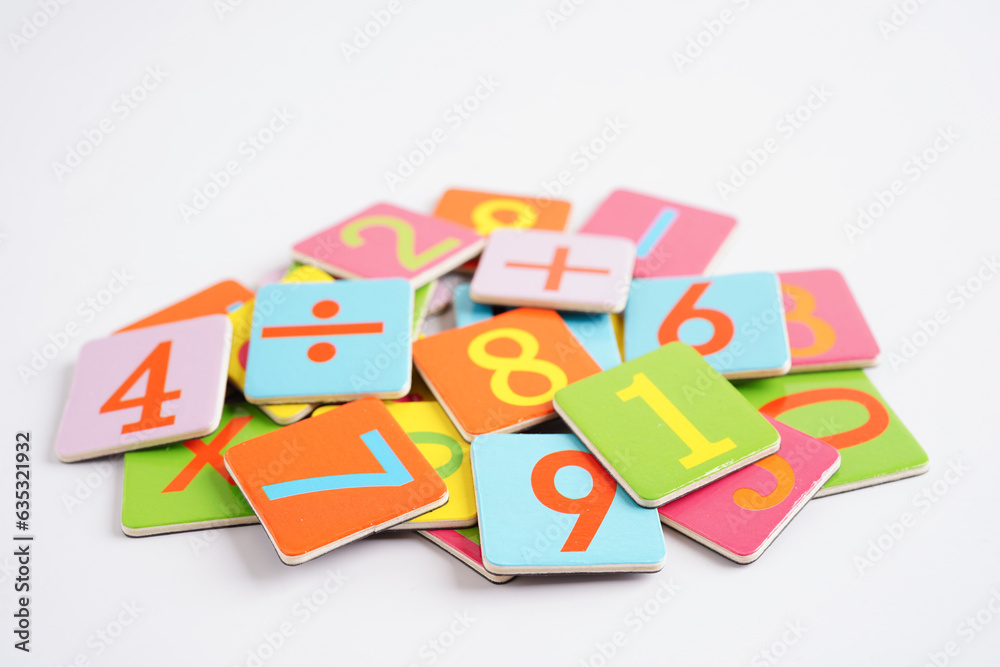 Number wood block cubes for learning Mathematic, education math concept.